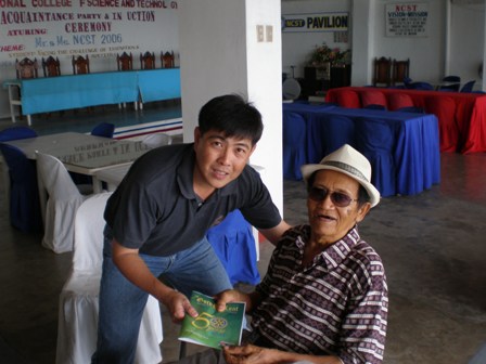 President Suki handing over the Gold Leaf .JPG
